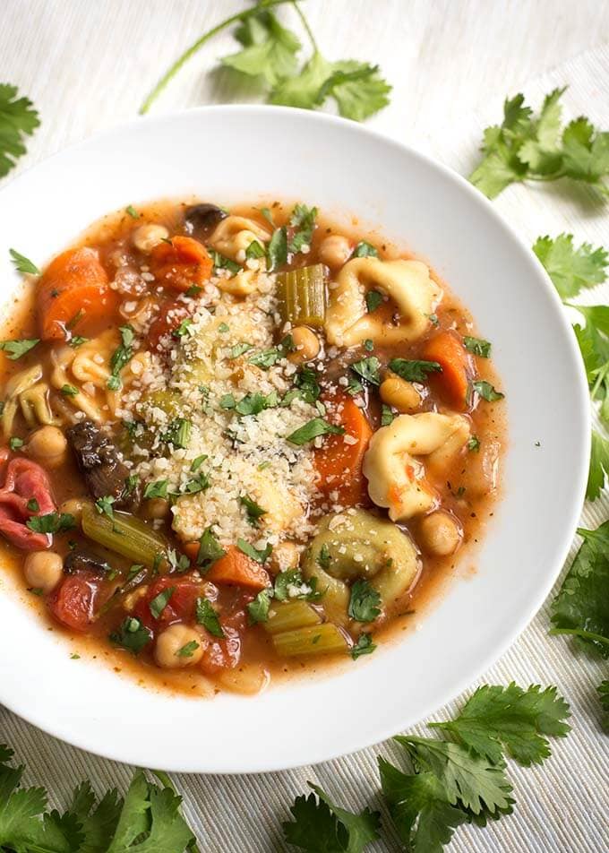 Vegetable Tortellini Soup in a white bowl