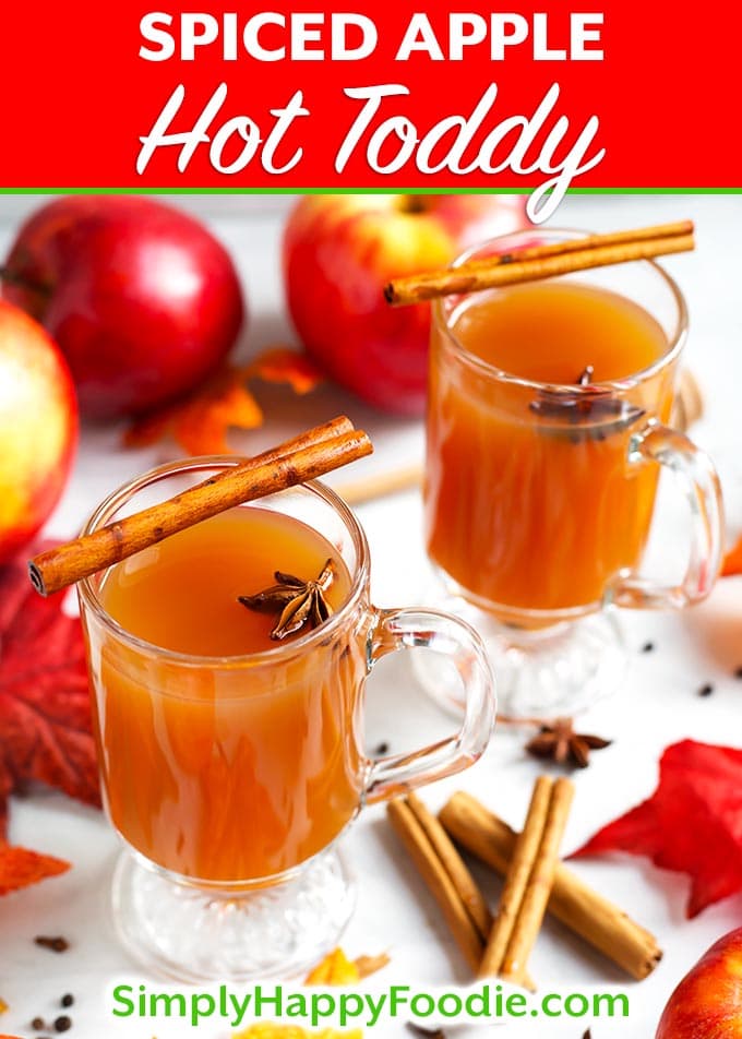 My Spiced Apple Hot Toddy recipe will warm you up from the inside. A deliciously sweet and spiced apple cider cocktail that is perfect for a chilly Fall or Winter evening. A hot cocktail recipe by simplyhappyfoodie.com #spicedapplehottoddy #hottoddy