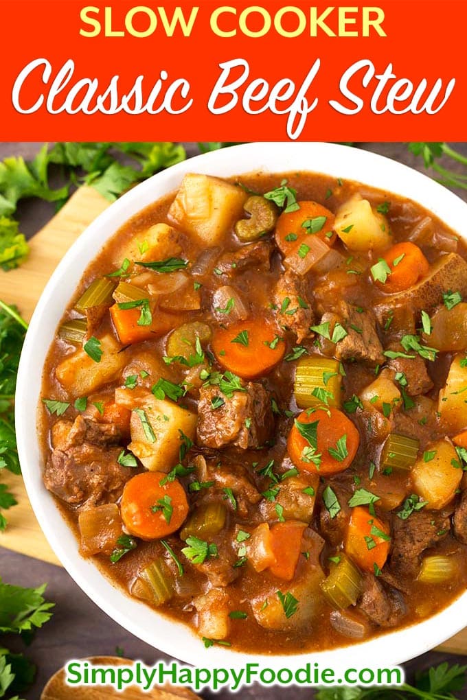 Classic Slow Cooker Beef Stew tastes just like the stew my mom used to make. No need for packaged soups in this comforting slow cooker beef stew. This crock pot beef stew recipe makes a lot, so you can feed a crowd! The best crock pot beef stew by simplyhappyfoodie.com #slowcookerbeefstew #crockpotbeefstew