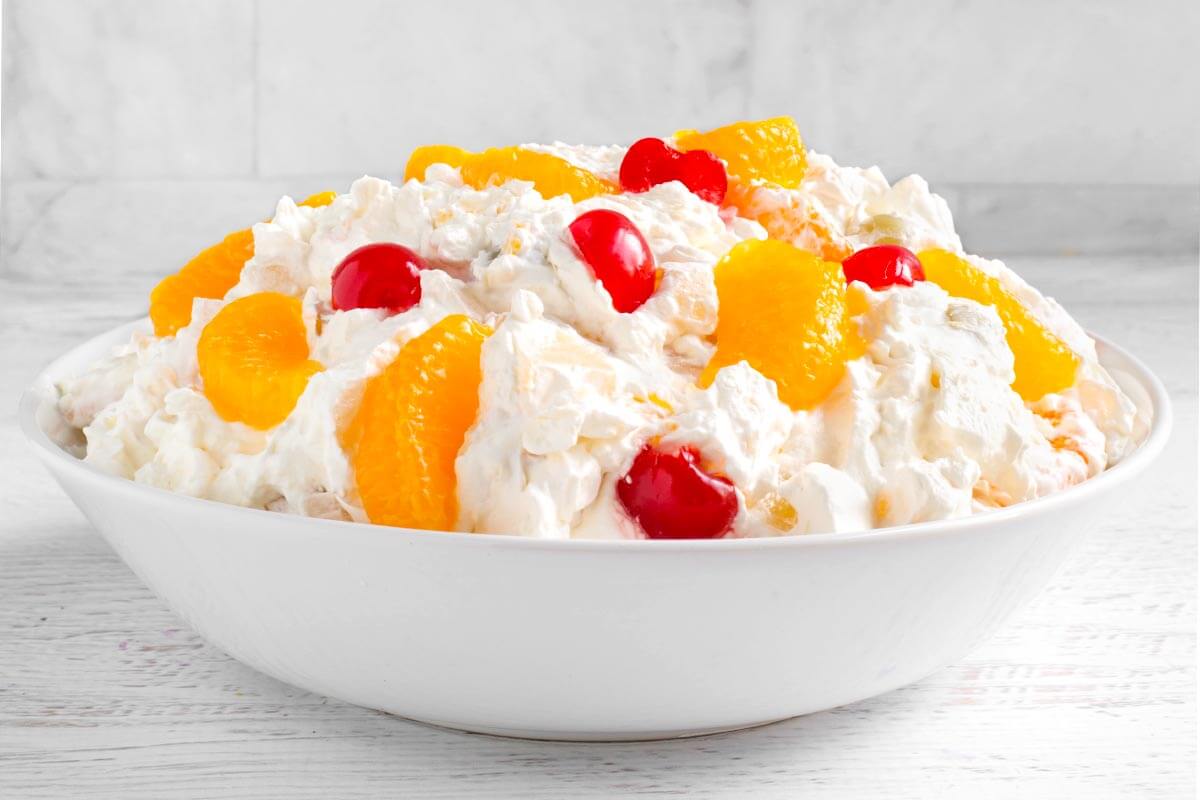 Creamy Fruit Salad in a white bowl