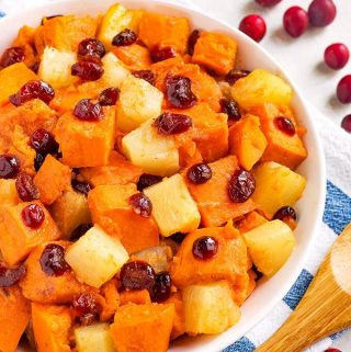 Instant Pot Sweet Potato Cranberry Casserole also has pineapple and some warm spices to make this a yummy Fall side dish. It's so fast to make, you will have a wonderful side on the table in 30 minutes or less! Pressure cooker sweet potatoes with cranberries is a tasty addition to tour Holiday meal. A great Instant Pot Thanksgiving side dish recipe! simplyhappyfoodie.com #instantpotswetpotatoes #instantpotthanksgiving
