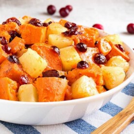 Instant Pot Sweet Potato Cranberry Casserole also has pineapple and some warm spices to make this a yummy Fall side dish. It's so fast to make, you will have a wonderful side on the table in 30 minutes or less! Pressure cooker sweet potatoes with cranberries is a tasty addition to tour Holiday meal. A great Instant Pot Thanksgiving side dish recipe! simplyhappyfoodie.com #instantpotswetpotatoes #instantpotthanksgiving