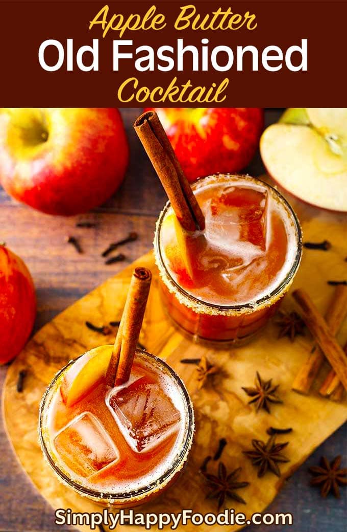 The Apple Butter Old Fashioned Cocktail is a delicious fall or winter cocktail made with real apple butter! This fabulous cocktail has warm spices and a nice apple flavor. Once you try it, this special Old Fashioned cocktail may become a favorite drink of yours! Bourbon cocktail recipe by simplyhappyfoodie.com #applebutteroldfashioned #oldfashionedcocktail