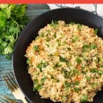 Instant Pot Brown Rice Pilaf in a black dish