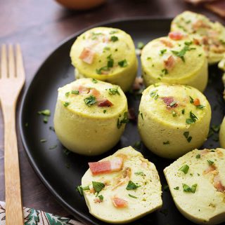 Instant Pot Egg Bites are soft, pillowy, delicious egg puffs. It all started with Starbucks® Sous Vide Egg Bites, and those have inspired these tasty breakfast pressure cooker egg bites! This is the best Instant Pot Egg Bites recipe! Change up the filling to make your favorite customized flavors! Instant Pot recipes by simplyhappyfoodie.com #instantpoteggbites #pressurecookereggbites