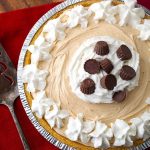 No Bake Peanut Butter Pie topped with whipped cream and chocolate candies has only 5 ingredients, but it tastes like you worked all day to make it! A sweet and creamy pie with delicious flavor that will satisfy the peanut butter lovers out there! This tasty peanut butter pie is perfect for a potluck, a party, or for any time you want an easy and yummy dessert! dessert recipes by simply happy foodie #nobakepie #nobakepeanutbutterpie