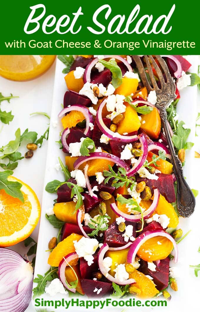 Beet Salad with Goat Cheese and Orange Vinaigrette is a wonderful salad that is full of amazing flavors. Served on a bed of baby arugula, it's a healthy meal. Also this beet salad is perfect as a small starter salad! simplyhappyfoodie.com #beetsalad #beetsaladorangevinaigrette
