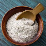 Homemade Ranch Dressing Mix in a wooden bowl with a wooden scoop