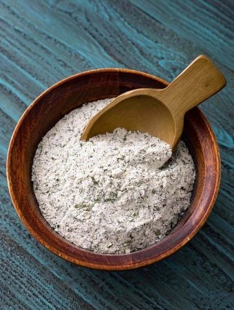 Homemade Ranch Dressing Mix in a wooden bowl with a wooden scoop