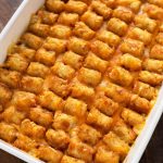 Hotdish Tater Tot Casserole in a white baking dish