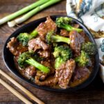 Instant Pot Beef and Broccoli in a black bowl