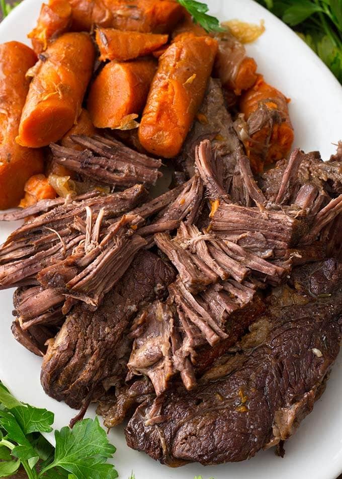 Closeup of Pot Roast on a white oblong platter