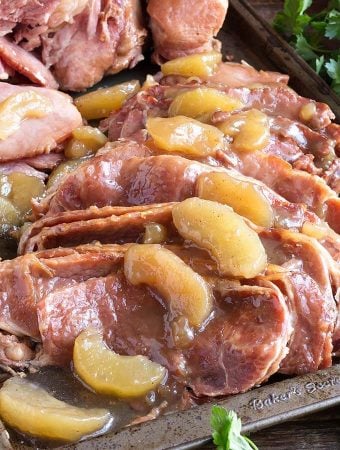 Sliced Apple Pie Ham on a baking sheet