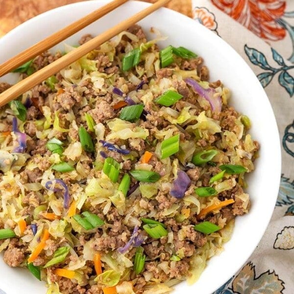 Egg Roll in a Bowl in a white bowl with two bamboo chopsticks