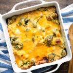 Broccoli Cauliflower Cheese Bake in white square baking dish