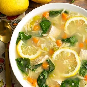 instant pot lemon chicken orzo soup in a white bowl