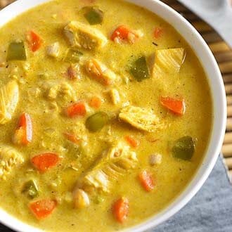 instant pot mulligatawny soup in a white bowl