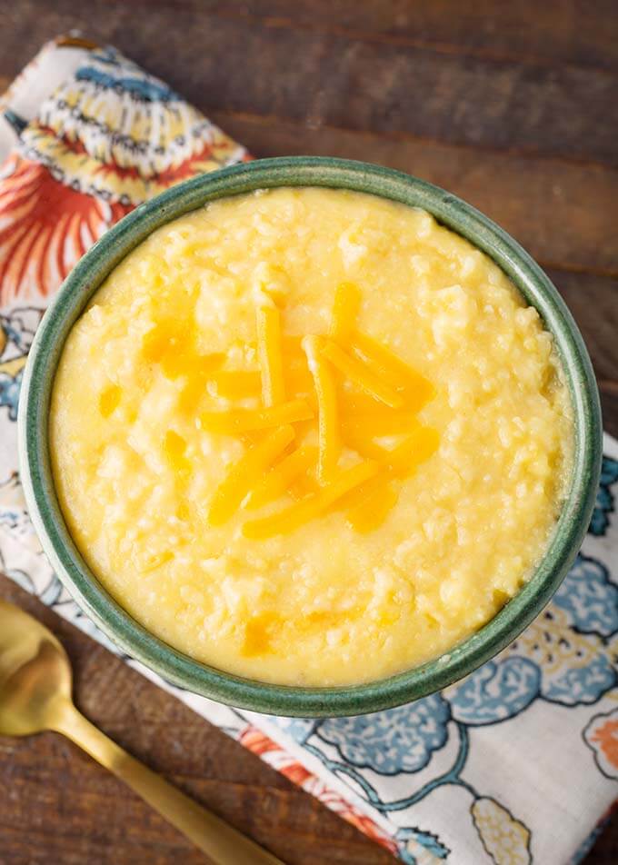 Slow Cooker Cheesy Grits in a green bowl