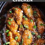 Slow Cooker Honey Garlic Chicken legs in a black crock