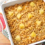 Southern Pineapple Casserole in a white square baking dish