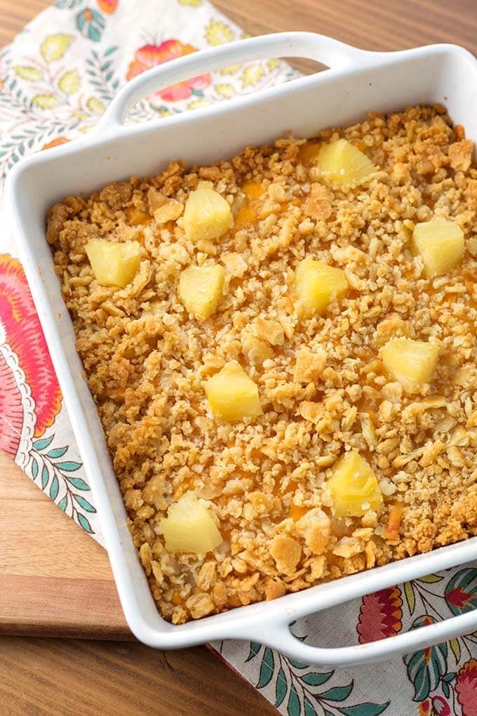 Southern Pineapple Casserole in a white square baking dish