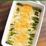 Creamy Baked Asparagus Alfredo in white baking dish