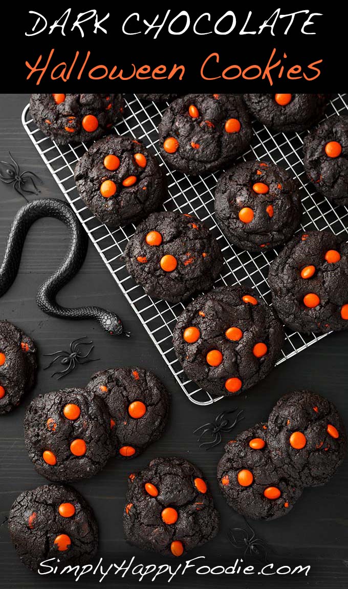 Dark Chocolate Halloween Cookies on cooling rack next to black plastic spiders and snakes with the title and Simply Happy Foodie.com logo