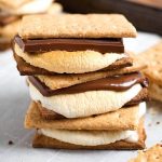 Indoor Oven S'mores stacked on a baking sheet