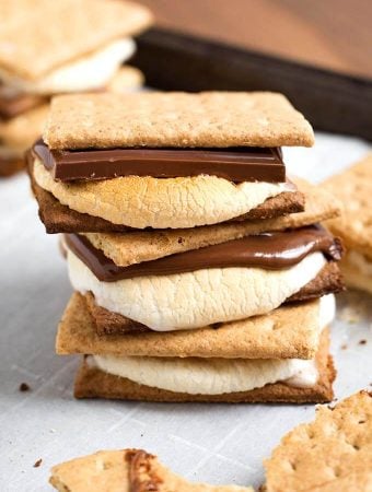 Indoor Oven S'mores stacked on a baking sheet