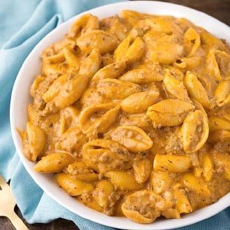 Creamy Beef and Shells in a white bowl