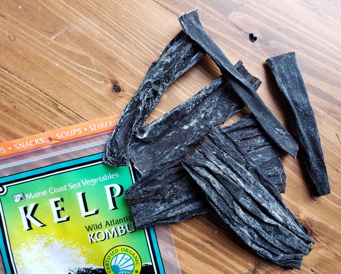 Kombu kelp on wooden surface with Kelp package