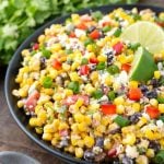 Mexican Street Corn Salad on a black plate