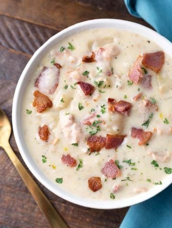 Slow Cooker Clam Chowder in a white bowl