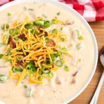 Slow Cooker Loaded Potato Soup in a white bowl