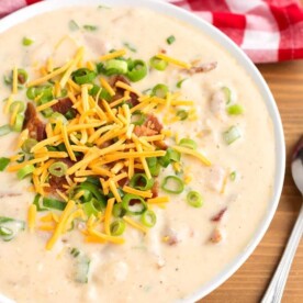 Slow Cooker Loaded Potato Soup in a white bowl