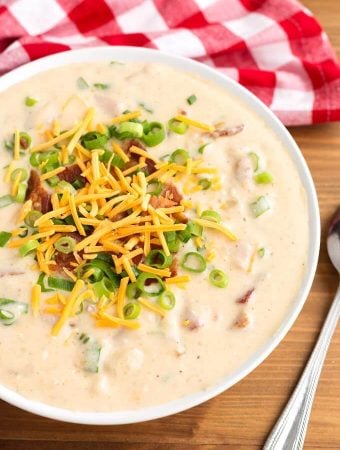 Slow Cooker Loaded Potato Soup in a white bowl