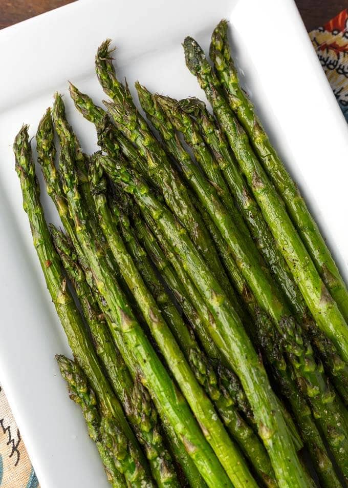 Air Fryer Asparagus on white rectangular dish