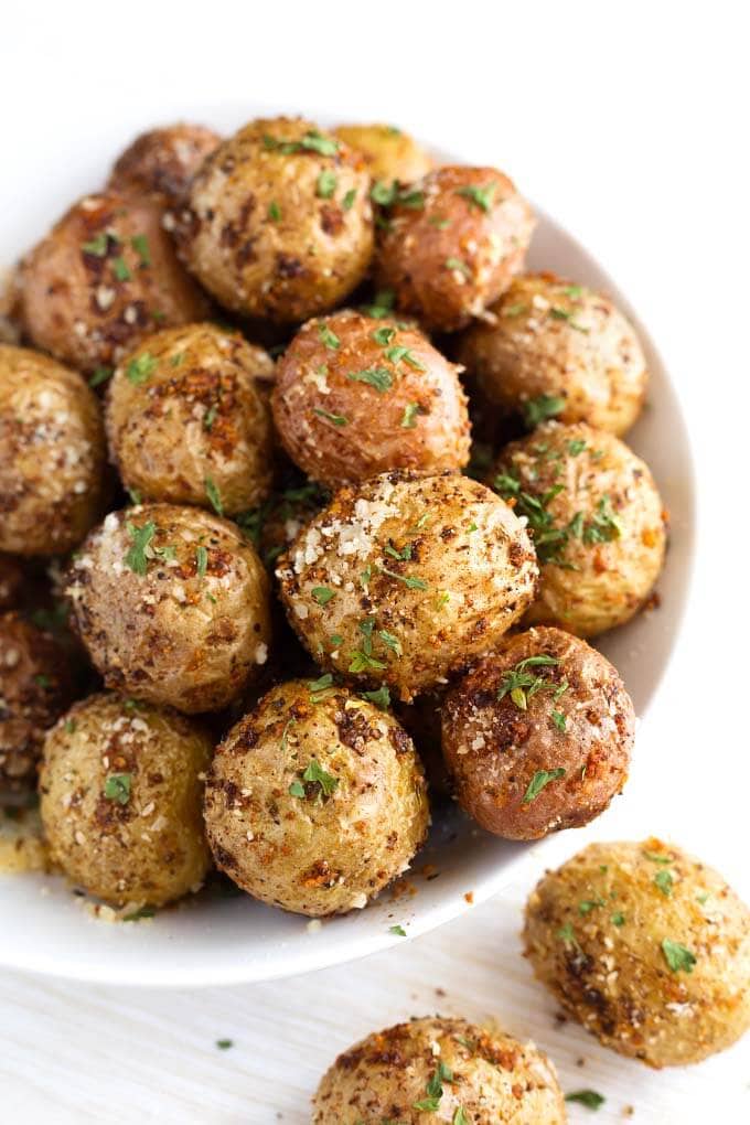 Air Fryer Garlic Parmesan Potatoes in a white bowl