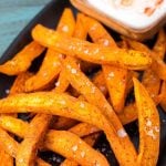 Air Fryer Sweet Potato Fries on a black plate