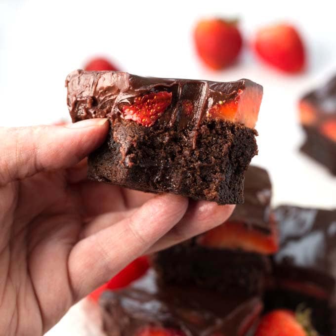hand holding Chocolate Covered Strawberry Brownies