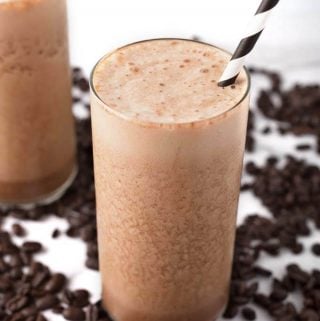Iced Coffee Protein Shakes surrounded by coffee beans