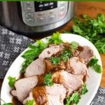 Instant Pot Balsamic Pork Loin Roast on a white platter