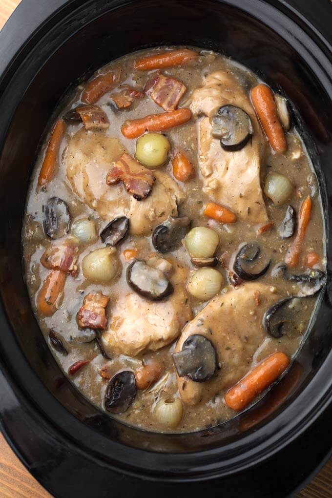 Coq Au Vin in a black slow cooker