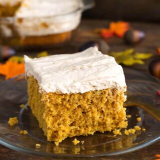 Pumpkin Cake with Cinnamon Butterscotch Frosting on glass plate