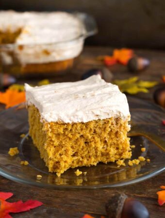 Pumpkin Cake with Cinnamon Butterscotch Frosting on glass plate