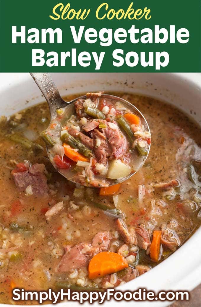 Slow Cooker Ham Vegetable Barley Soup in white bowl as well as title and Simply Happy Foodie.com logo