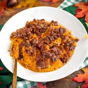 Slow Cooker Candied Sweet Potatoes in white dish
