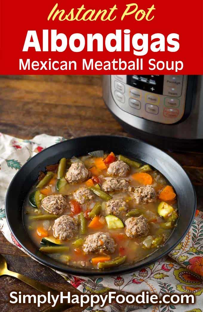 Instant Pot Albondigas Soup in black bowl in front of pressure cooker as well as title and Simply Happy Foodie.com logo