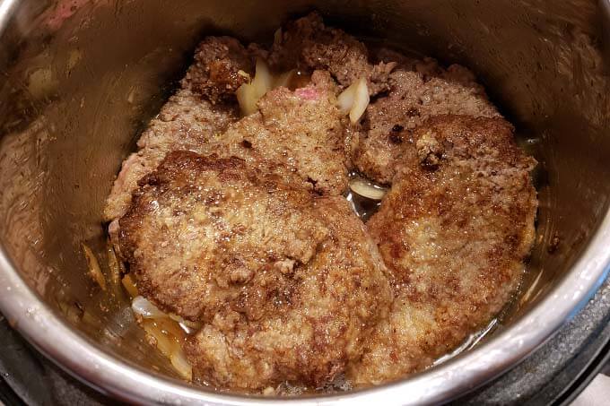browned cube steaks in the pot