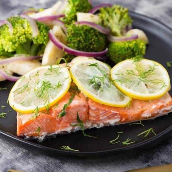Instant Pot Lemon Butter Salmon and Vegetables on black plate